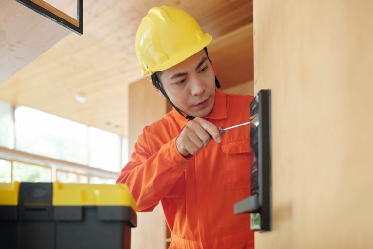 Workman,In,Overall,And,Hardhat,Installing,Smart,Electronic,Door,Lock