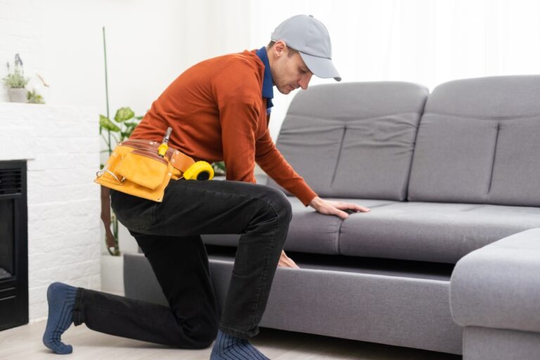 A,Man,Works,In,A,Furniture,Repair,Workshop,And,Pulls