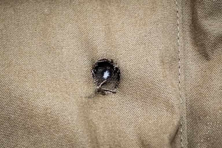 A,Cigarette,Burn,In,The,Cotton,Fabric,Of,A,Shirt
