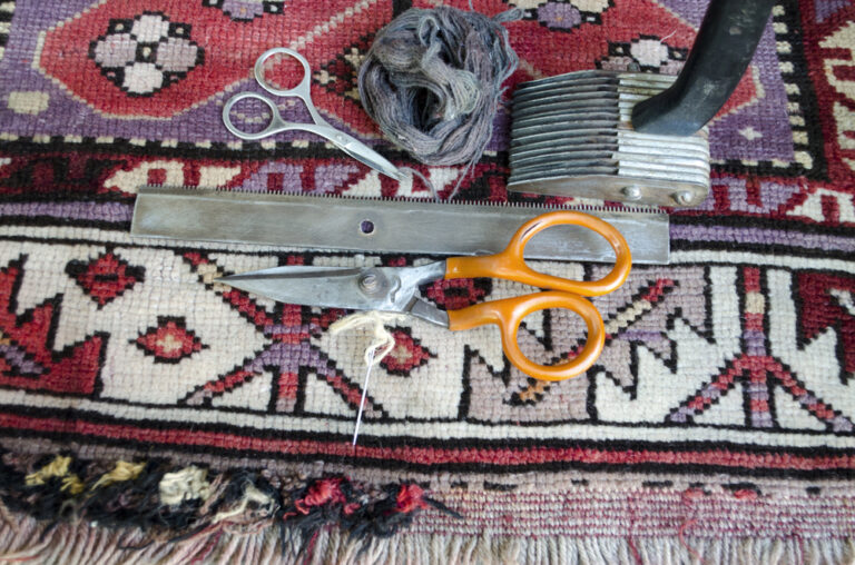 The,Old,Of,Worn,Woolen,Carpet,With,Tools,For,The